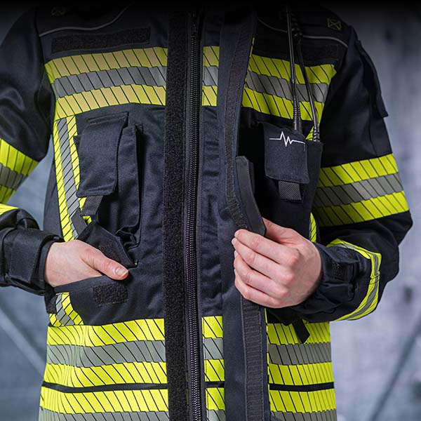 Verdeckter YKK-Spiralreißverschluss mit Aramid-Neopren-Griff für einfaches Öffnen
